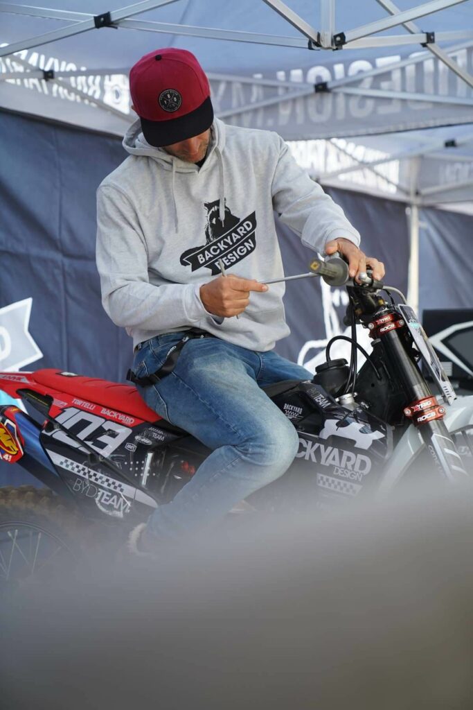 Pro Backyard Design Team Rider Sebastien Tortelli adjusting his brake levers